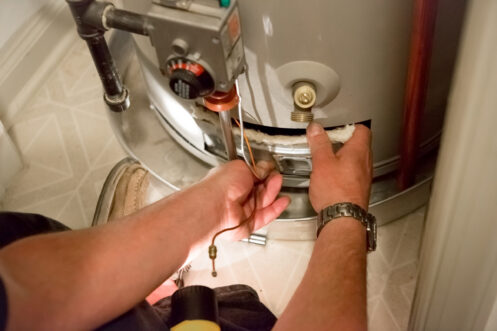 Plumber checking the water heater in Sacramento
