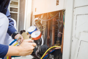 An HVAC tech checking a furnace in Sacramento